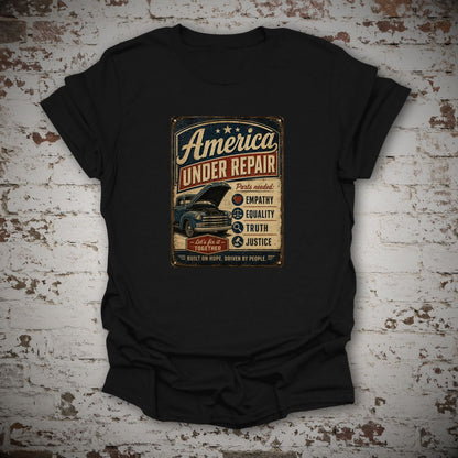 America Under Repair Political T-Shirt in Black, flat lay mockup