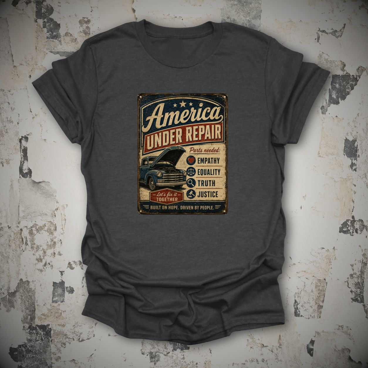 America Under Repair Political T-Shirt in Dark Heather Grey, flat lay mockup
